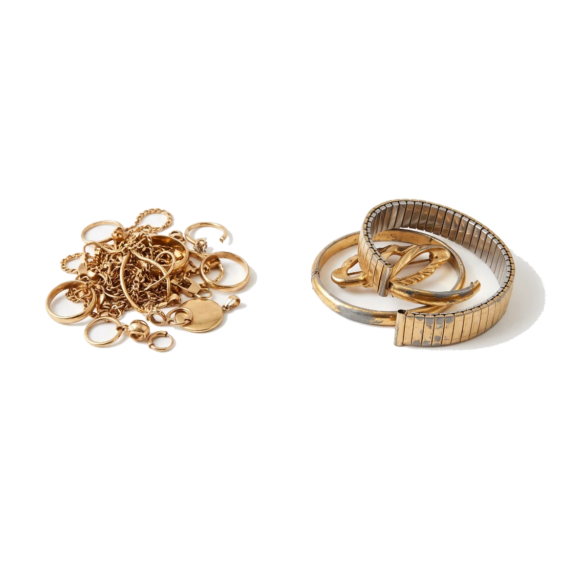A heap of solid gold scrap set apart from plated costume pieces whose plating has worn through.