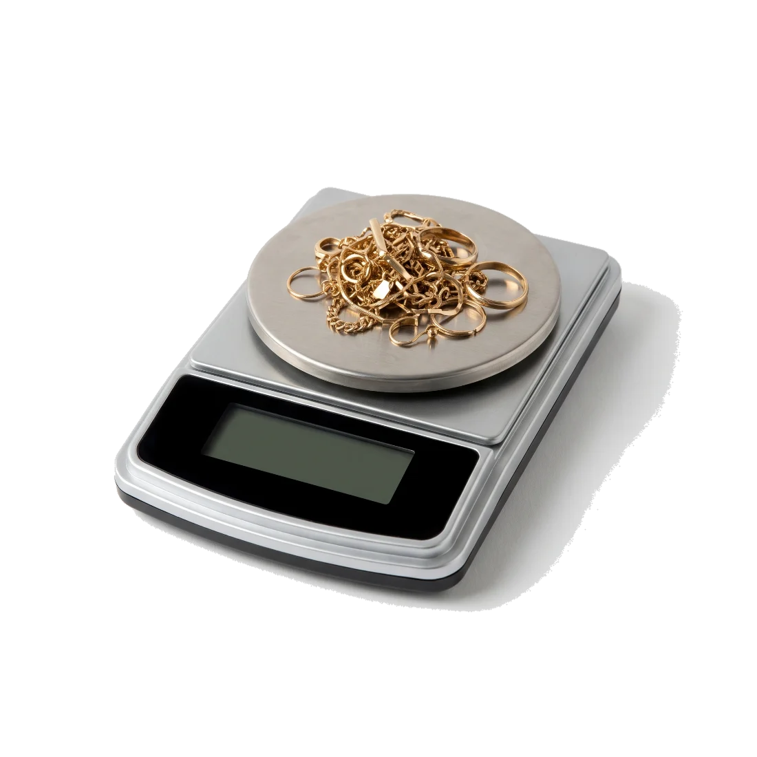 A precision scale with a heap of scrap gold jewellery on its pan.