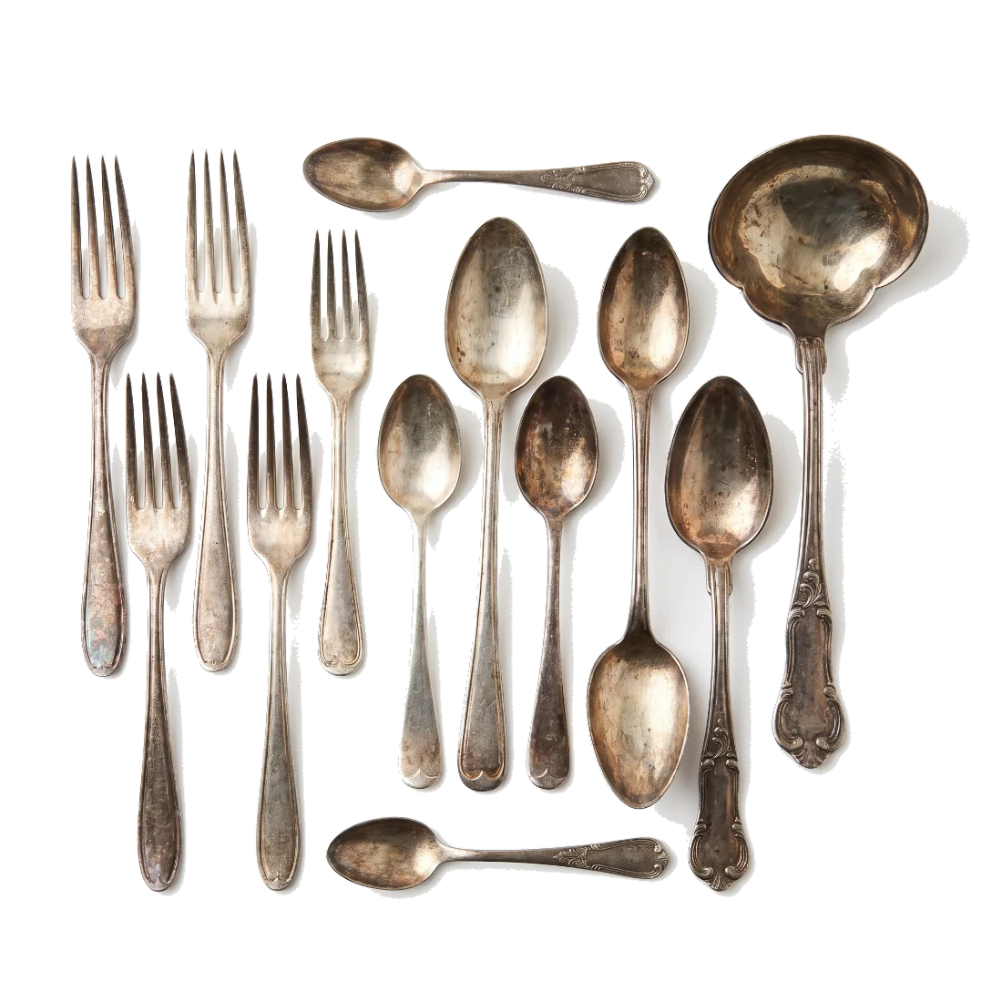 Tarnished silver flatware.