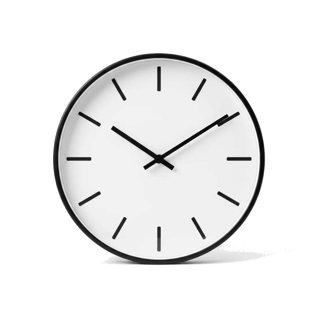 A plain round wall clock with its hands at half past ten.
