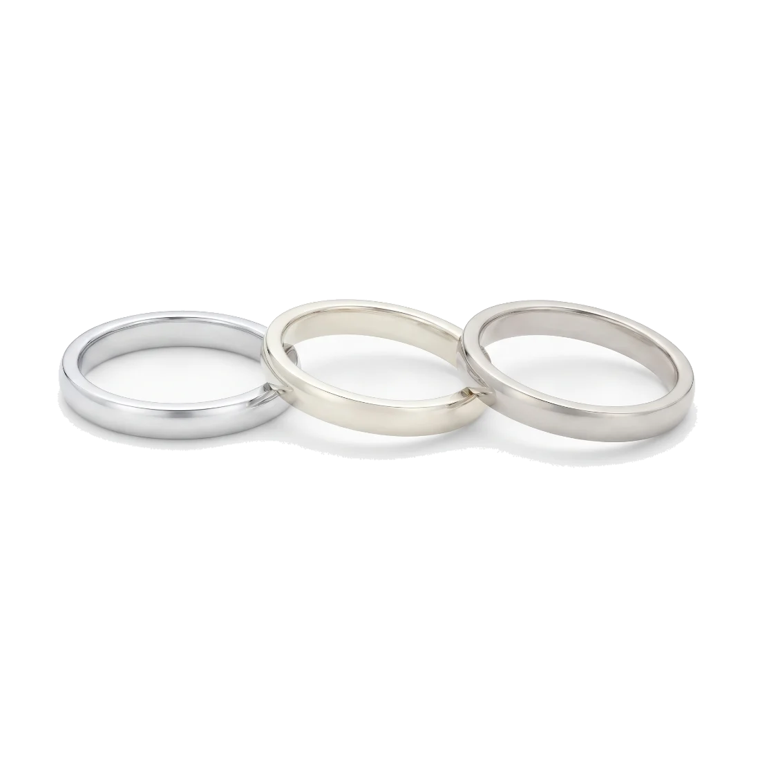 Three plain white metal rings that look alike, each a slightly different white.